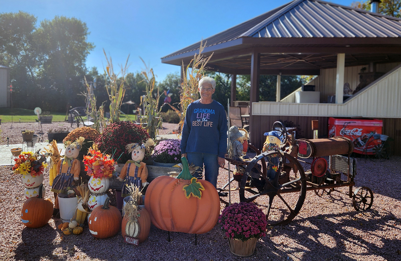 Kathy Larson with pumpkins