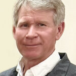 Thomas “Tom” J. Foster