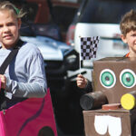kids wearing cardboard car costumes