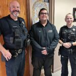 Clark High School graduate learning from local officers
