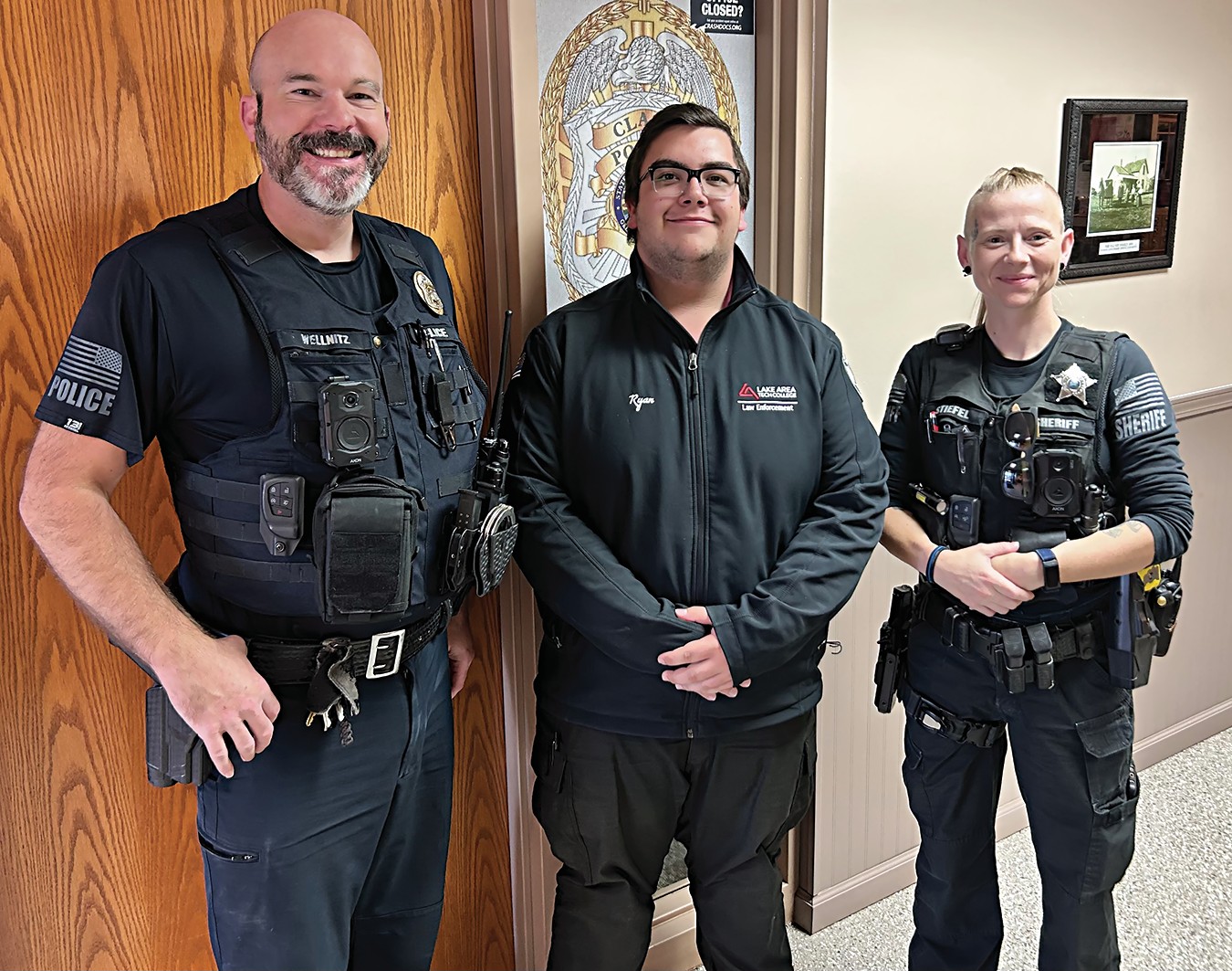 Clark High School graduate learning from local officers